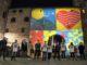 Porta Consolare illuminata con i colori dell’iniziativa di beneficenza “Spello nel cuore”