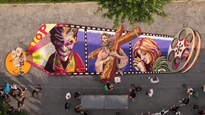Infiorate di Spello 2025, il gruppo “Aisa” vince con l’infiorata “Disarmare le parole”